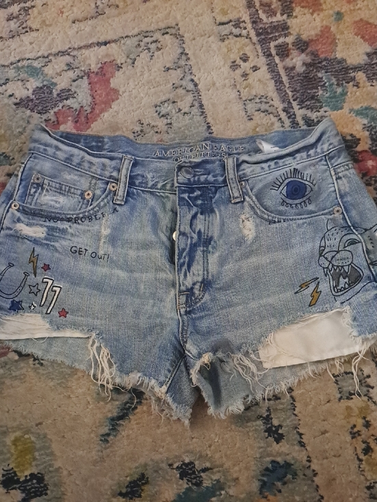 American Eagle Outfitters Pants - American Eagle Light Blue Distressed Denim Shorts with Sketchbook Graphics, Sz 6